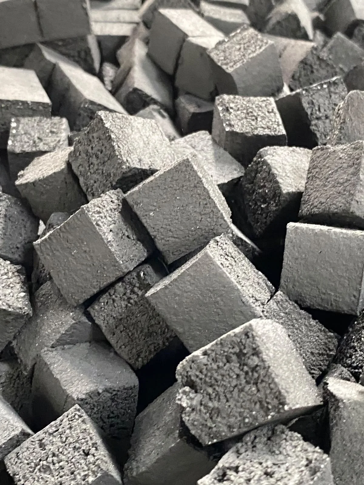 Close-up of coconut charcoal briquette texture