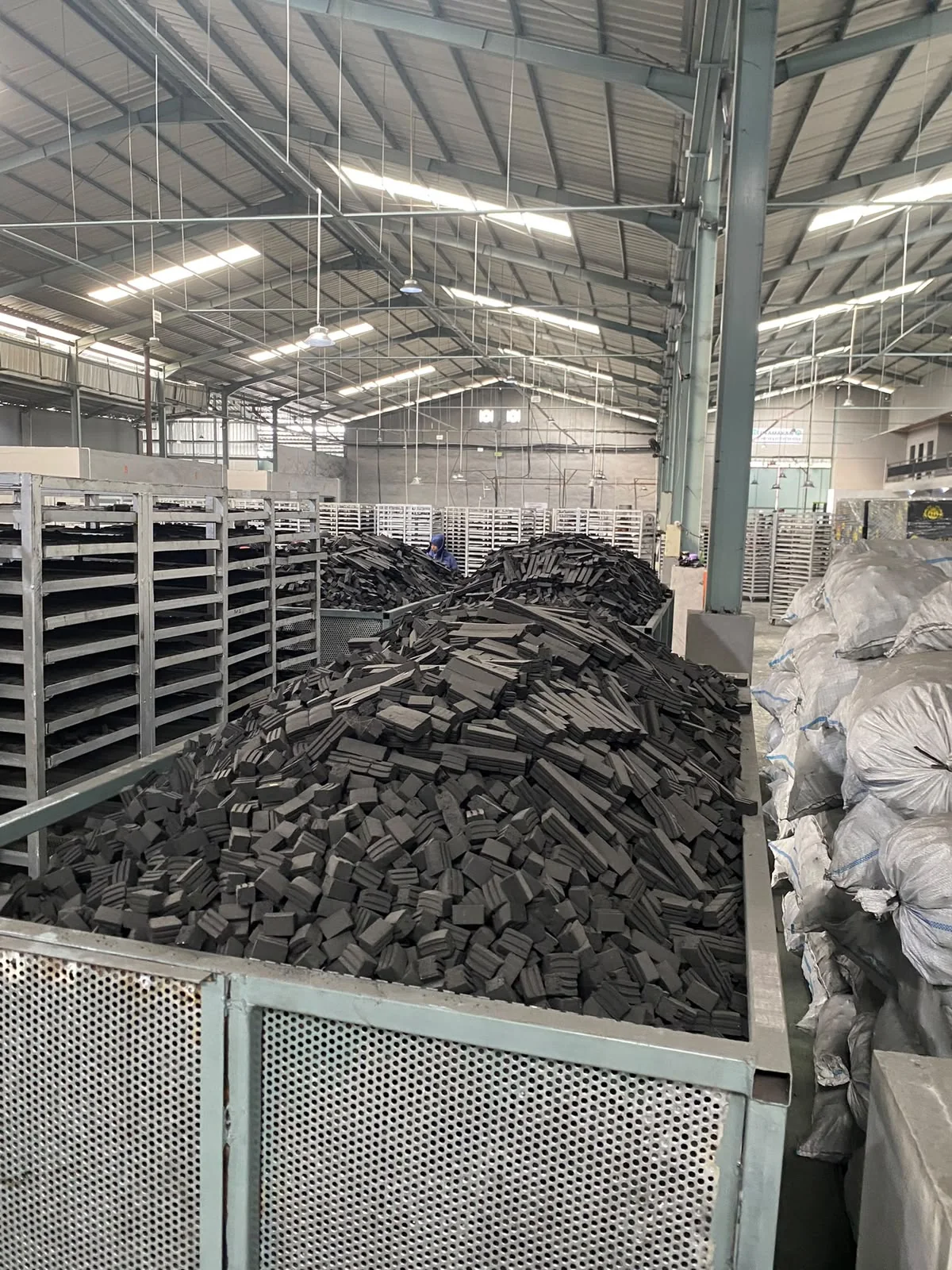 Charcoal briquettes stored inside factory