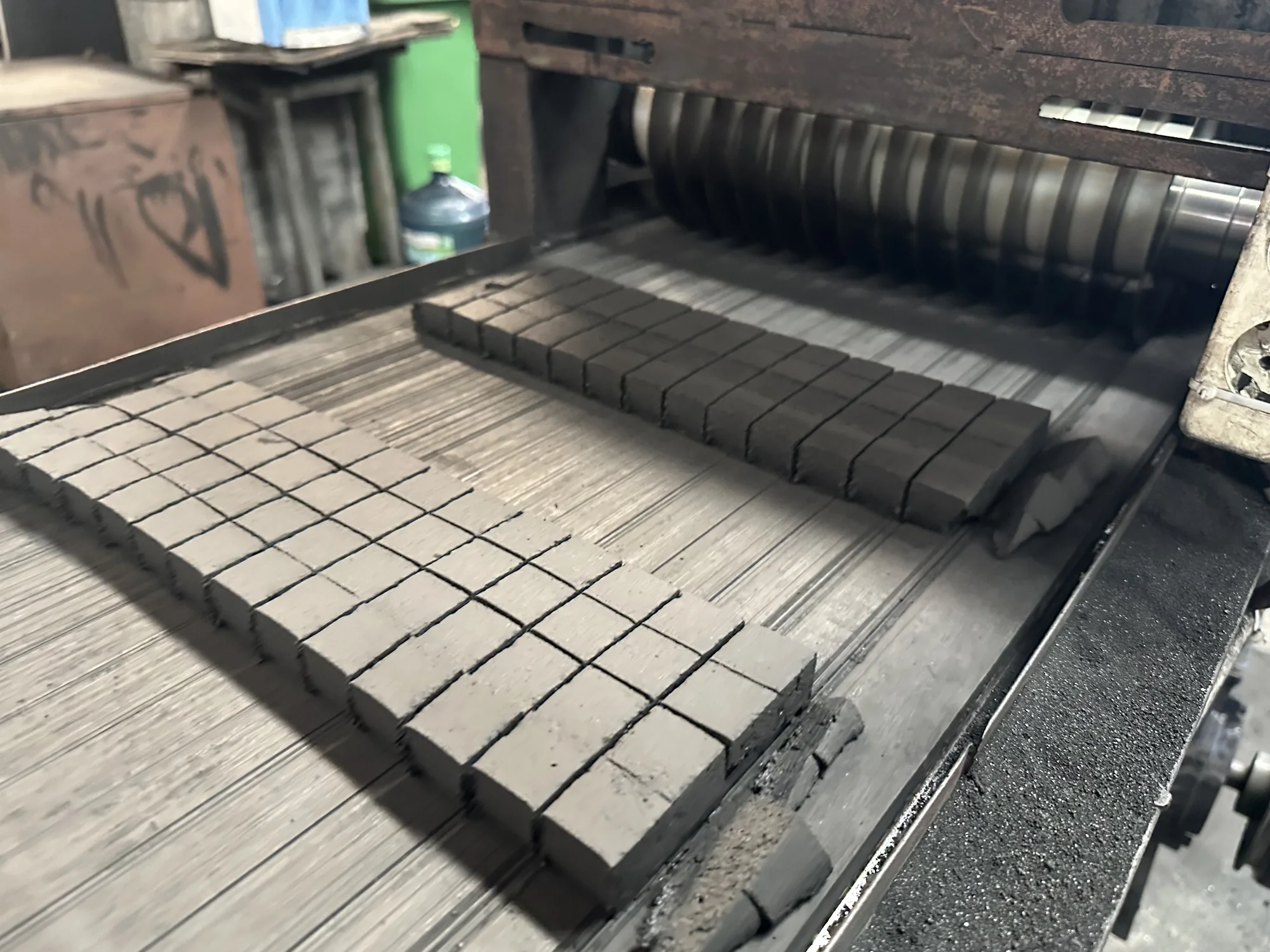 Charcoal briquette forming process